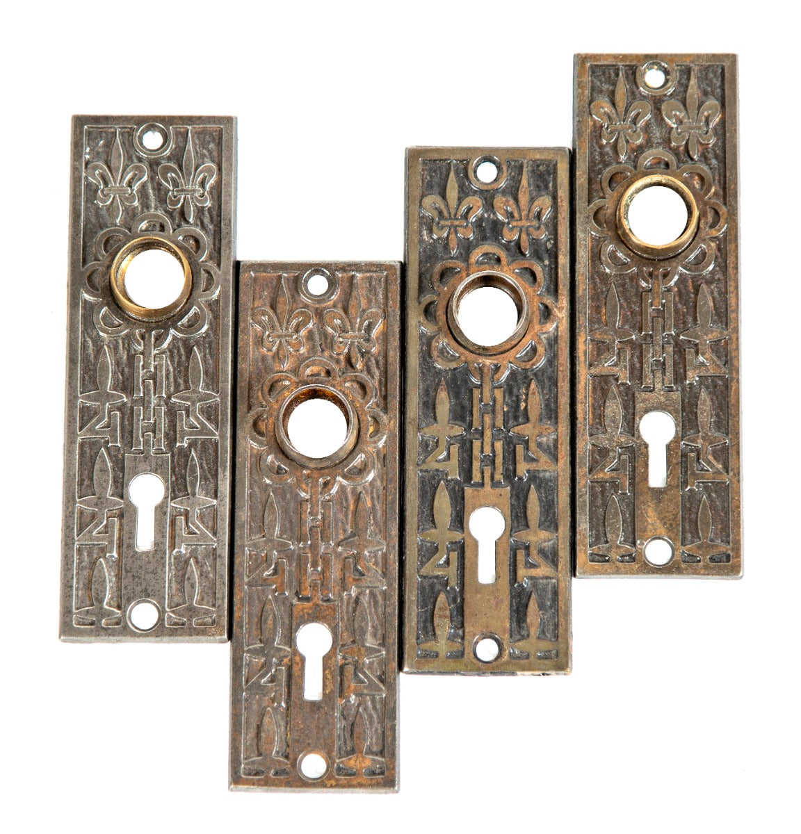 19th century "fleur-de-lis" pattern cast iron residential passage door backplates with wrought steel thimbles