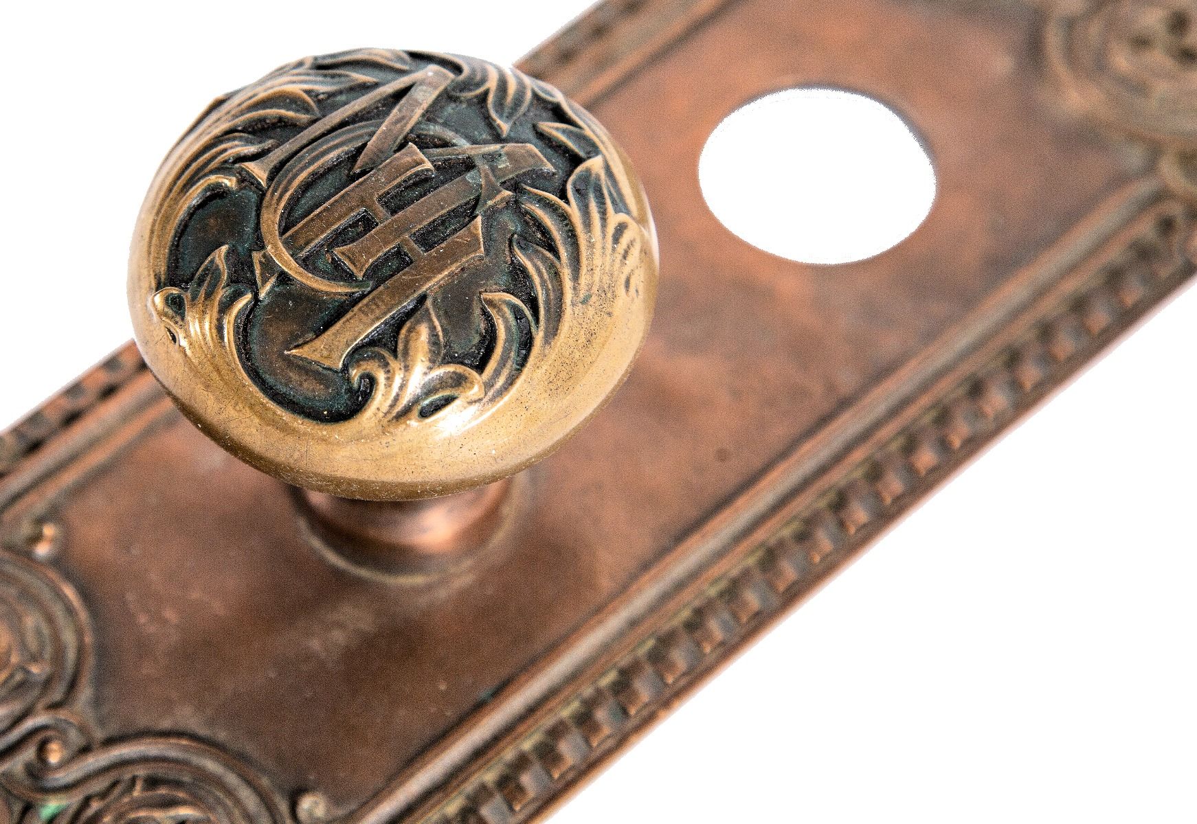 19th century custom-designed richardsonian romanesque cast bronze minneapolis city hall monogrammed doorknob and backplate