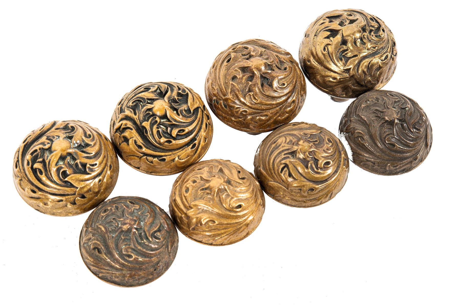 group of four matching 19th century "florence" pattern ornamental cast bronze entrance and interior doorknob sets