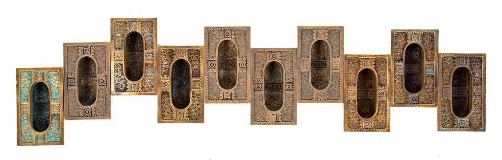 ten matching highly sought after ornamental cast bronze "ivy" pattern residential window sash pulls with nicely aged patina