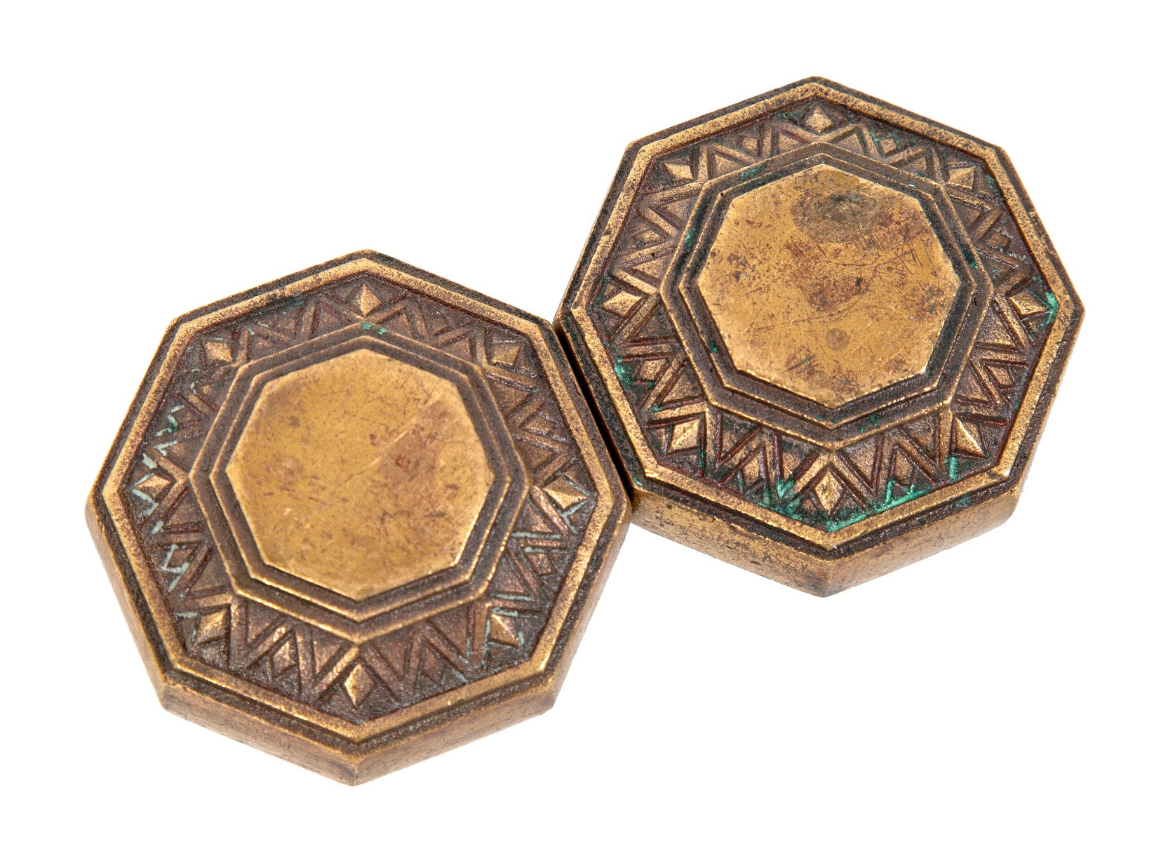 two matching original and highly sought after holabird and root-designed palmolive building art deco cast bronze doorknobs