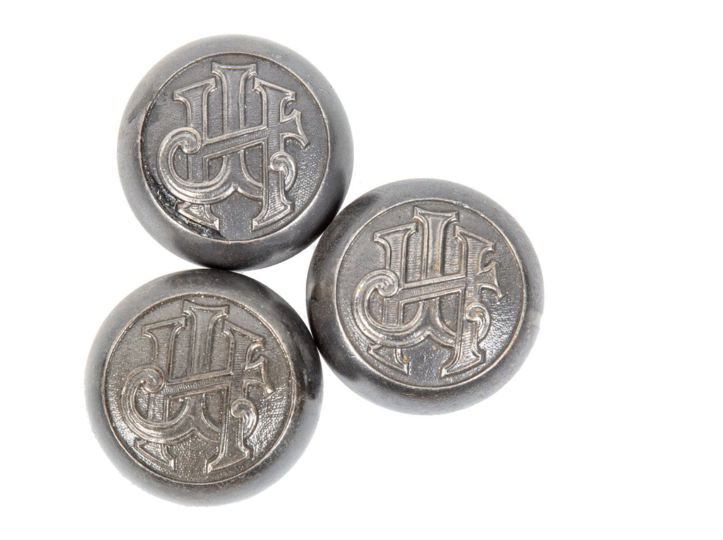 group of three original and intact early 20th century salvaged st. louis monogrammed cast iron jefferson hotel doorknobs