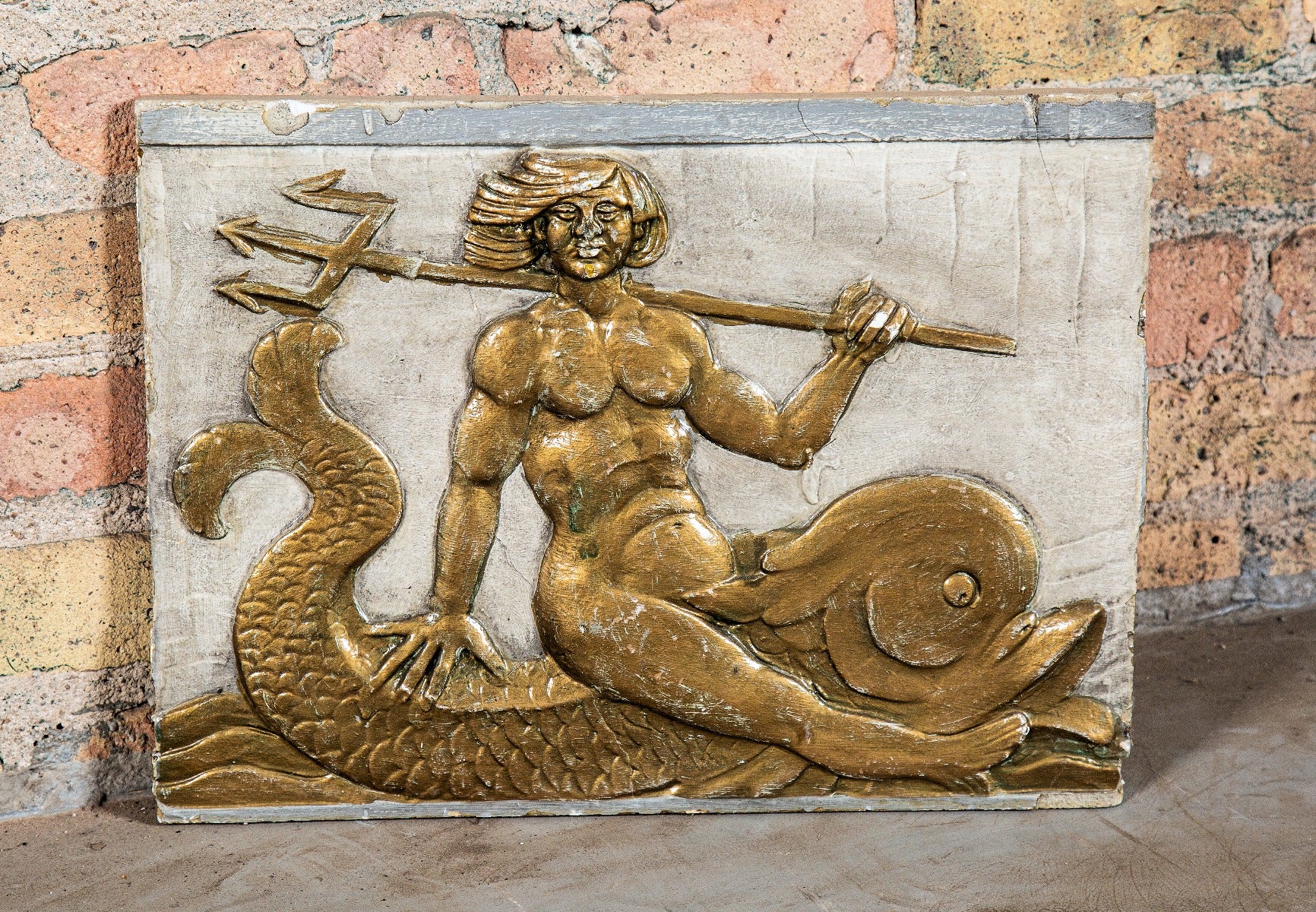 historically important c. 1930's american depression era art deco style cast plaster nauticalesque nortown theater interior lobby panel featuring man with trident