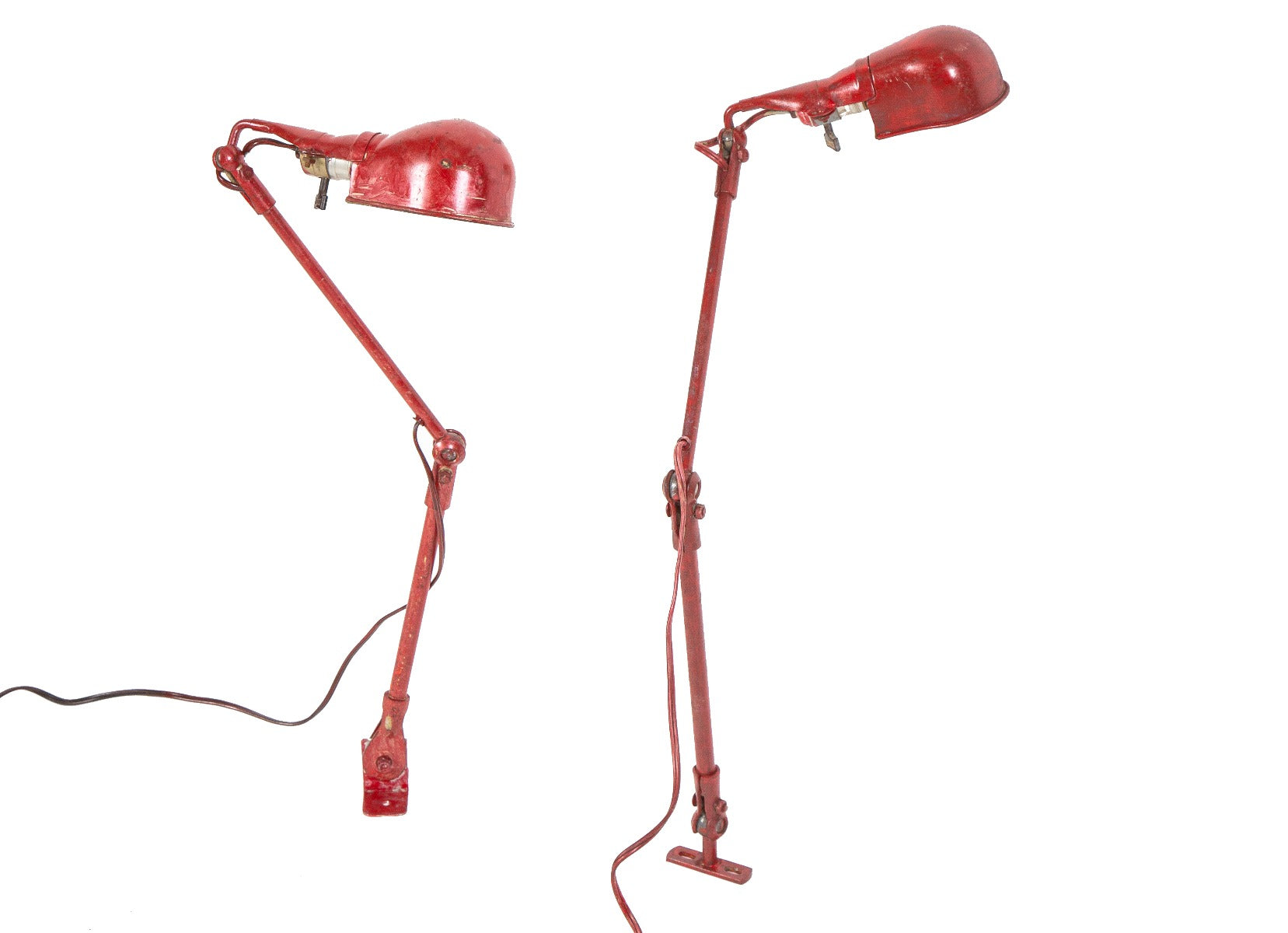 two nearly identical vintage american industrial salvaged chicago factory machine shop fostoria articulating lamps