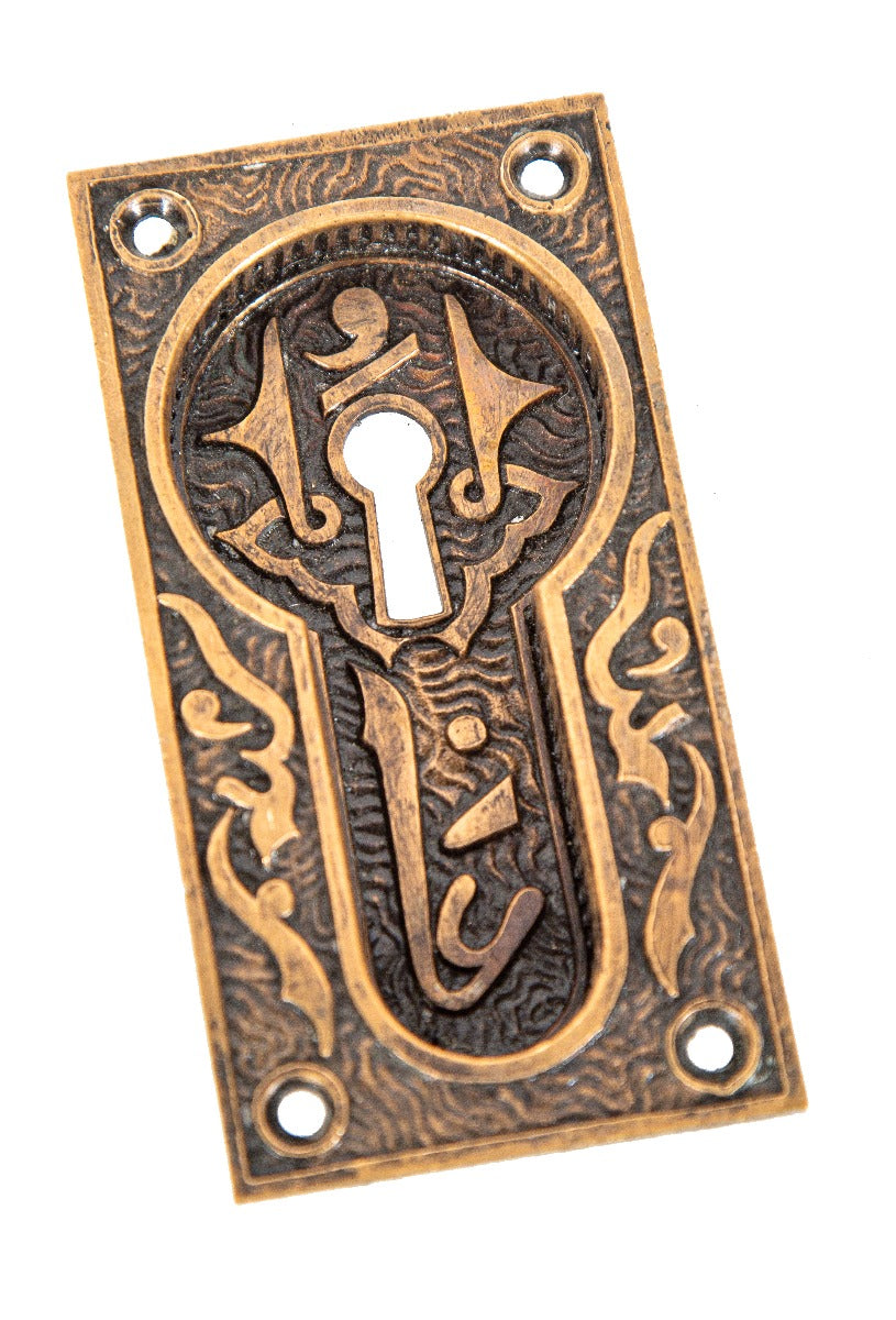 highly sought after 19th century "arabic" pattern ornamental cast bronze interior residential pocket door backplate by mallory wheeler