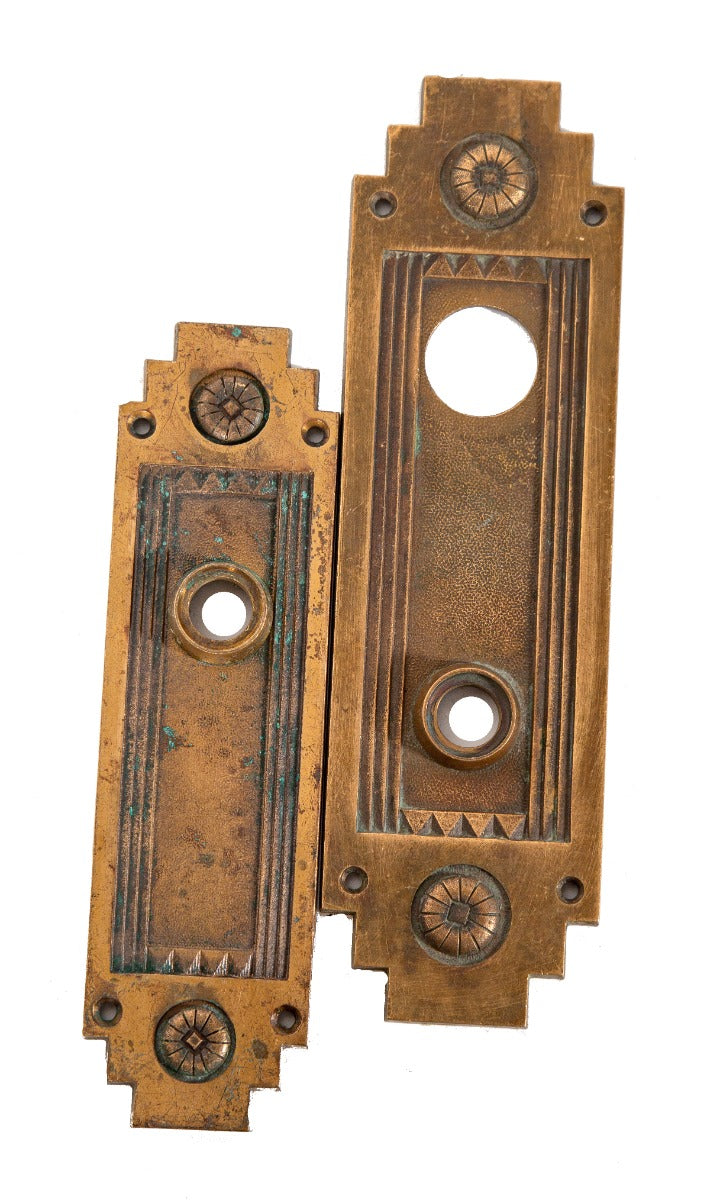 matching set of holabird and root-designed oranamental cast bronze art deco palmolive building office door backplates