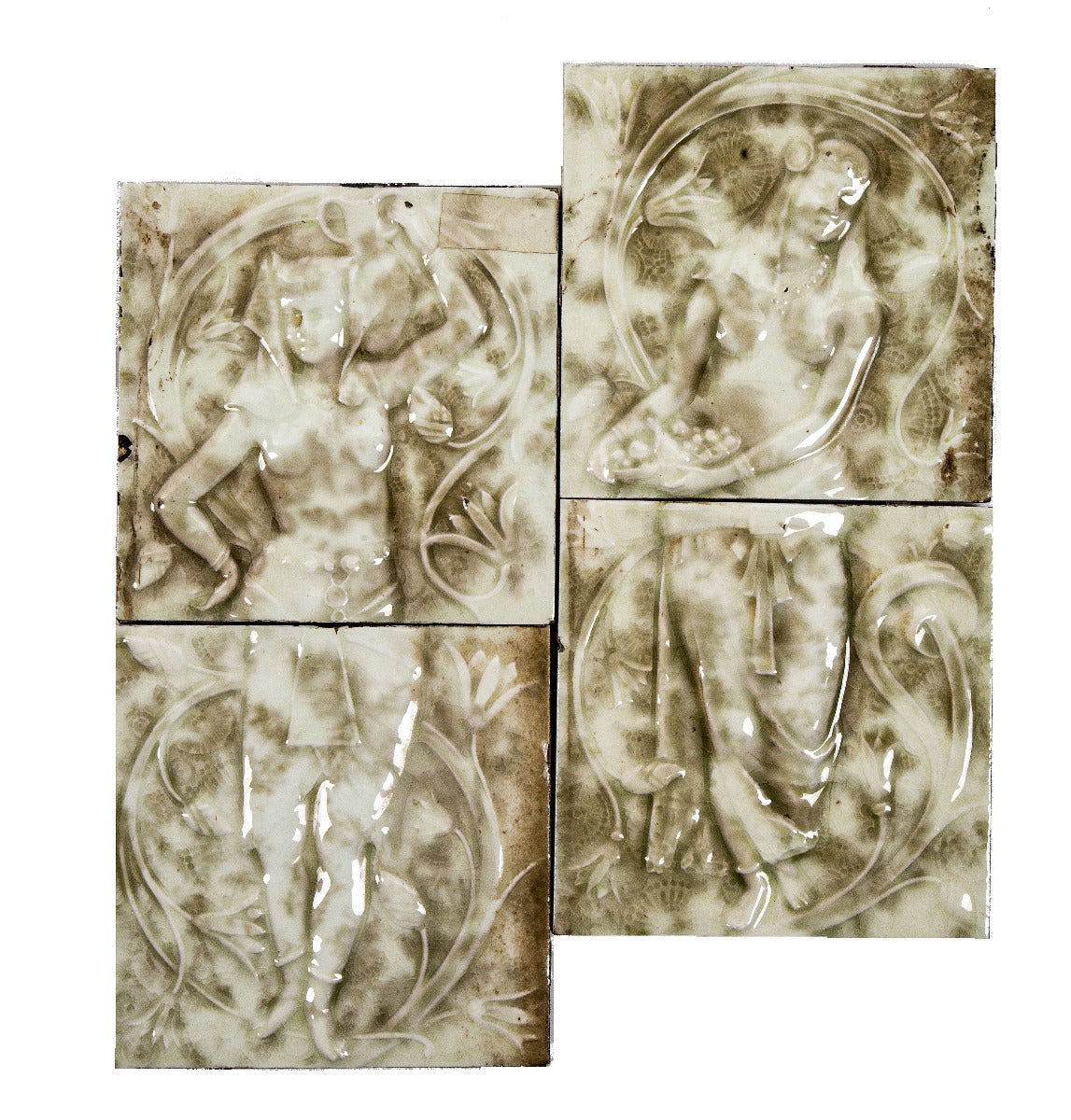 pair of 19th century mottled green antique american egyptian revival full-figured majolica fireplace tile sets