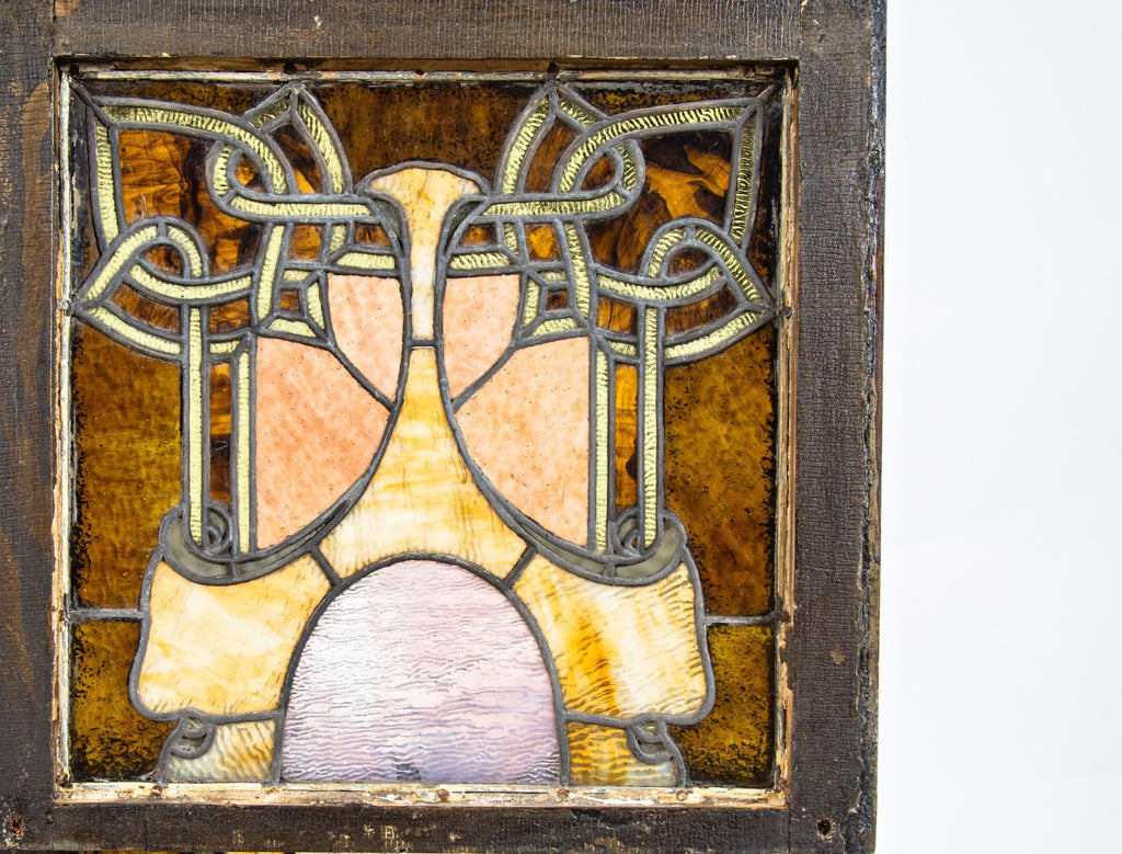 healy and millet-designed stained glass double-sash window with elegantly designed celtic border