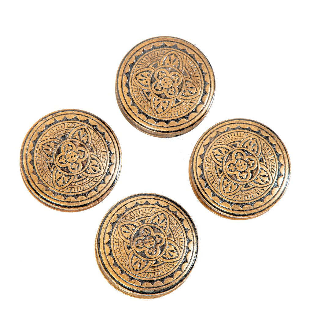 four matching all original 1880s gothic revival style ornamental cast bronze drum-shaped antique american residential doorknobs with black enameled inlay