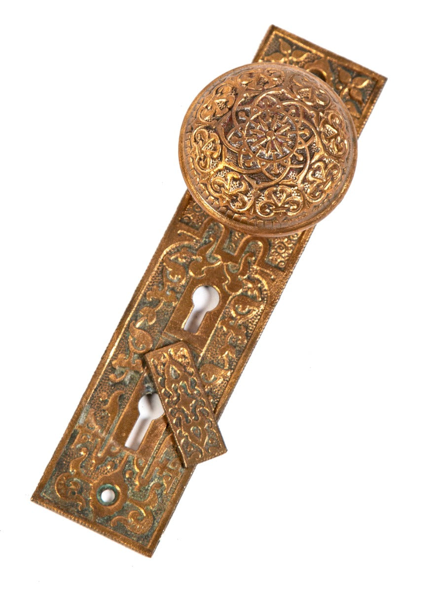 1875 original ornamental cast bronze russell and erwin dome-shaped doorknob and backplate with swinging keyhole cover