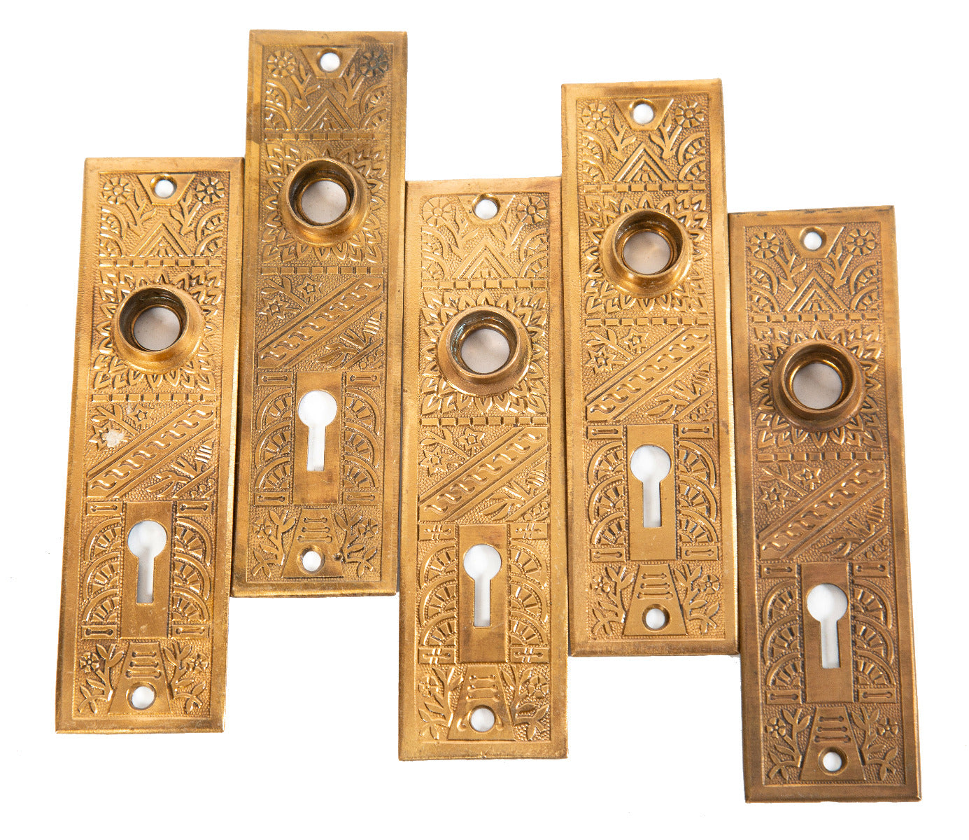 five matching original ornamental wrought bronze late 19th century interior residential doorknob backplates