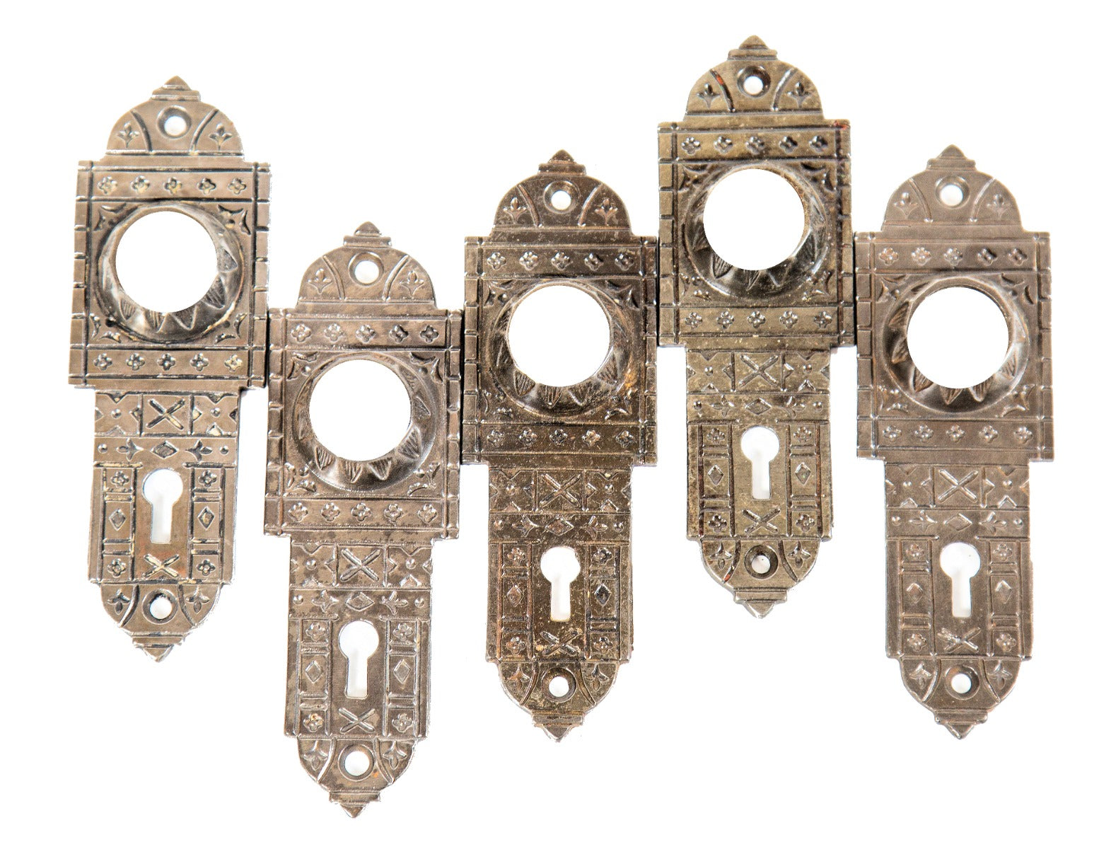 group of five 19th century original refinished residential ornamental cast iron "screwless" spindle passage door backplates