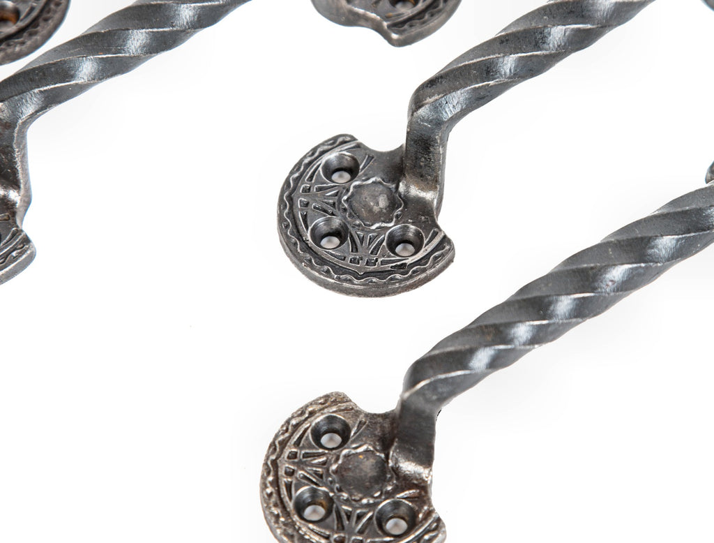 matching set of original louis sullivan-designed ornamental cast iron chicago stock exchange window sash pulls with bower-barff finish