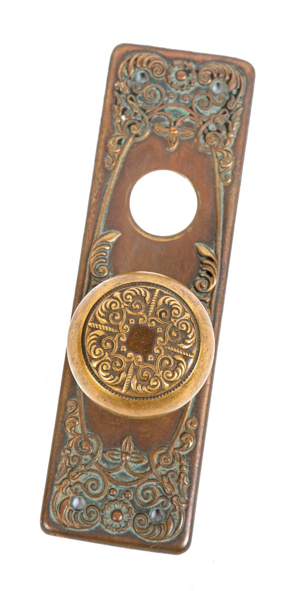 original early 20th century antique american ornamental cast brass entrance door size "alexandria" pattern doorknob and matching backplate