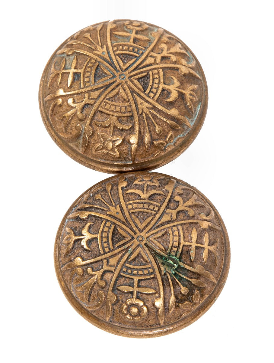 matching set of original nicely aged early 1880s eastlake style ornamental cast bronze banded rim passage size doorknobs