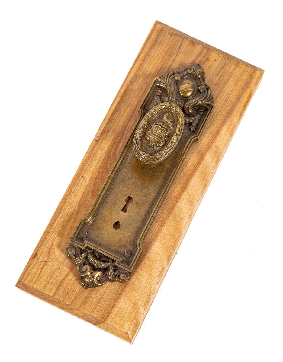 mounted early 20th century salvaged chicago marshall and fix-designed cast brass custom blackstone hotel doorknob and backplate
