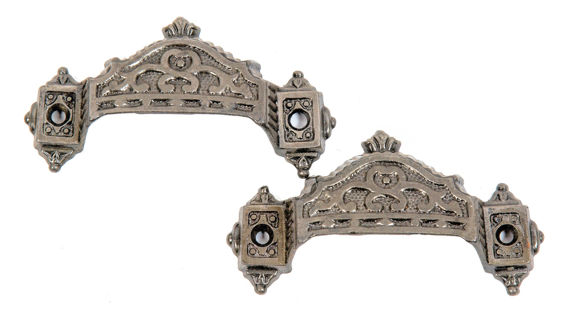 two matching original 1870s refinished ornamental uniquely shaped cast iron residential drawer pulls