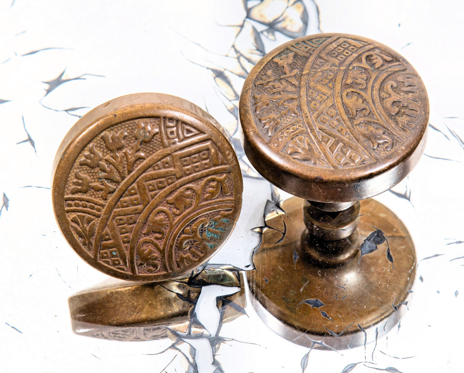 matching set of original 1880s antique american ornamental wrought brass "ceylon" pattern interior residential drum-shaped doorknobs