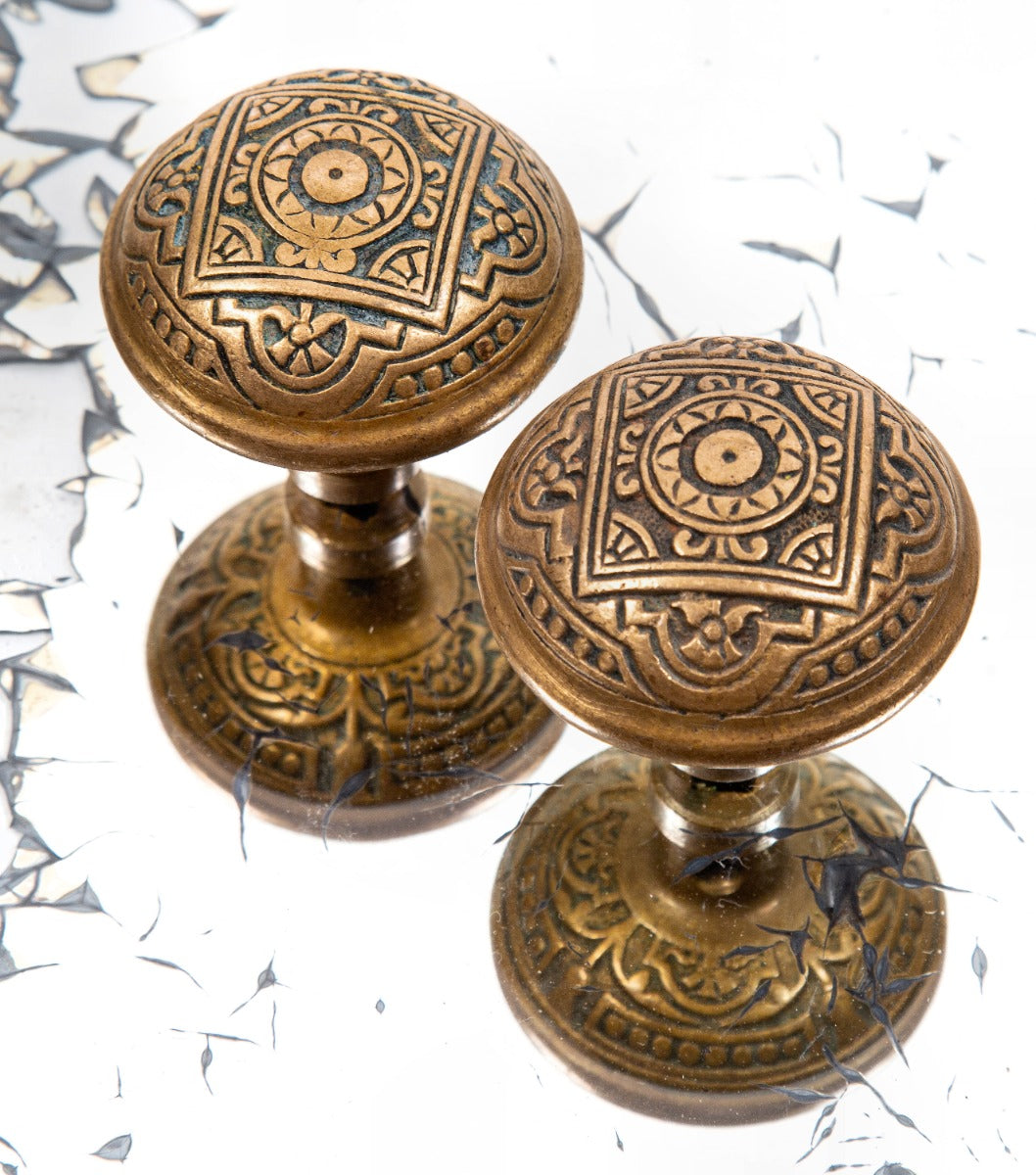 original 1880s antique american ornamental cast brass interior residential eastlake style doorknobs fabricated by the barrows hardware company