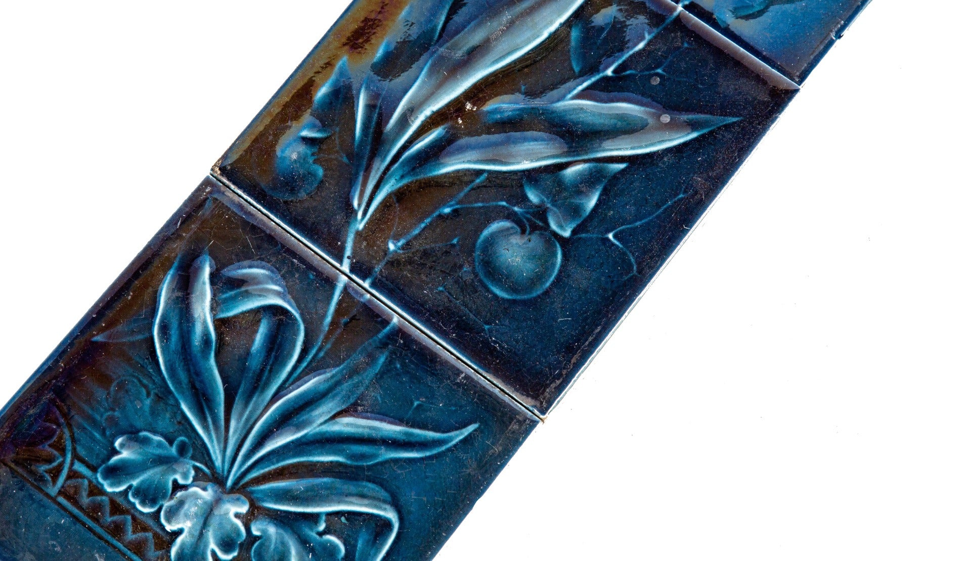 highly stylized and vibrantly colored lot of 19th century victorian-era cobalt blue majolica glazed trent tile floral set