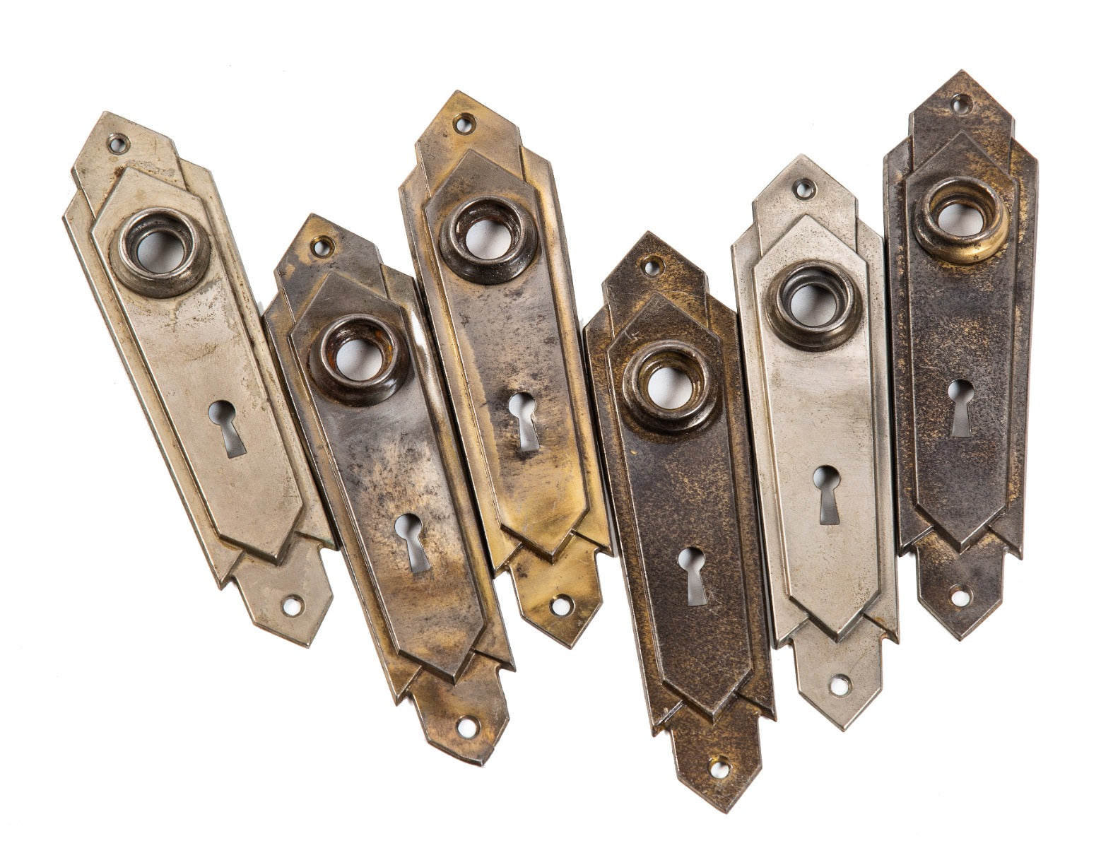 group of early 1920s antique american art deco style streamlined style nickel-plated doorknob backplates