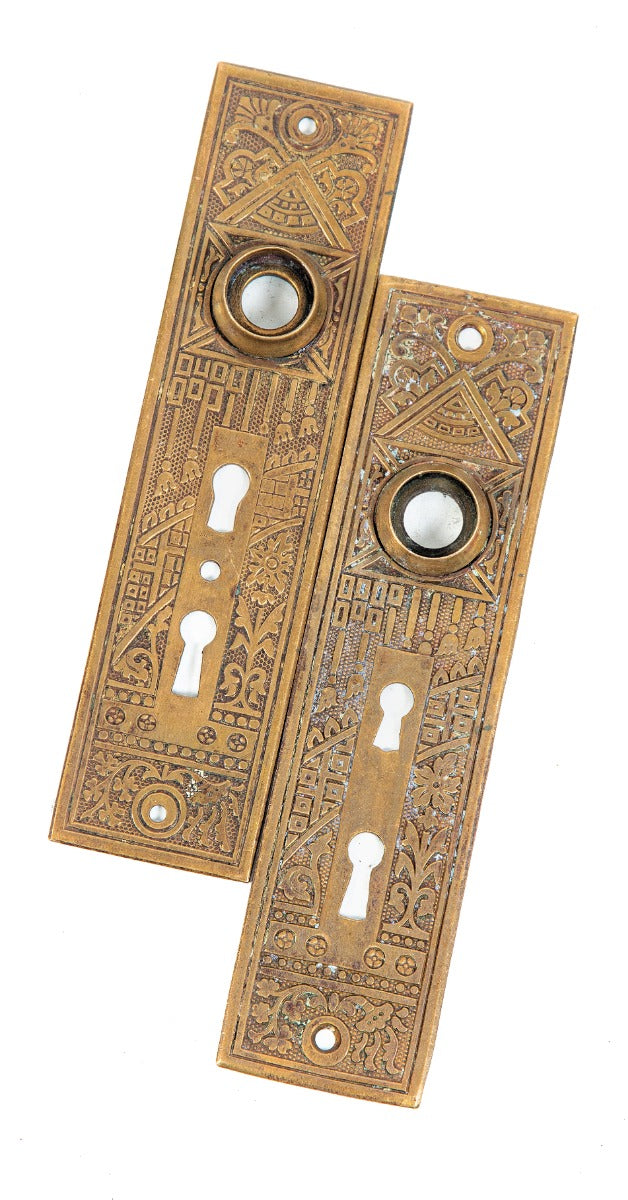 two matching original ornamental wrought brass "ceylon" pattern salvaged chicago residential entrance door backplates