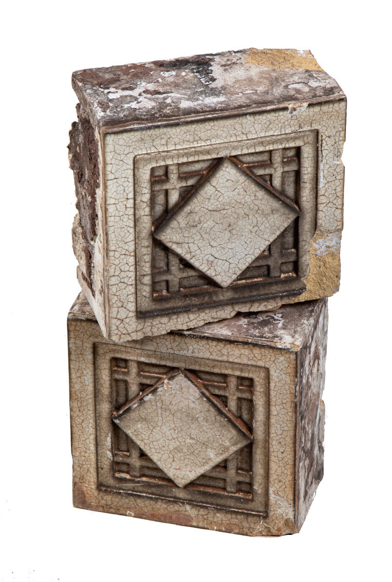 two matching early 20th century sullivanesque style white glazed midland terra cotta exterior blocks with allover crazing