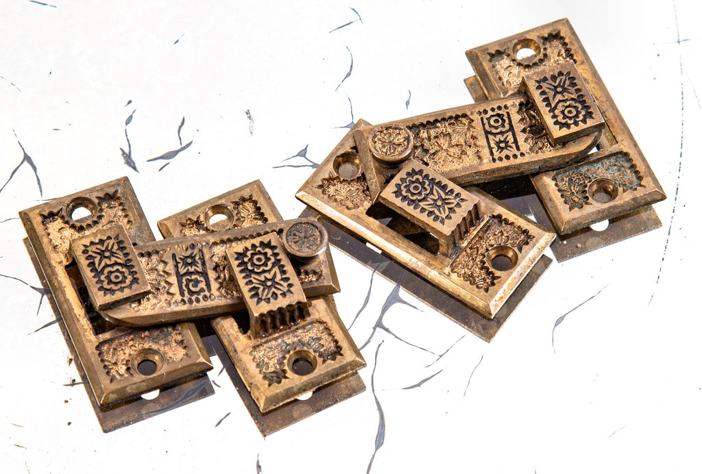 hard to find original 1880s ornamental cast brass "ivy" pattern interior residential shutter latches with matching keepers