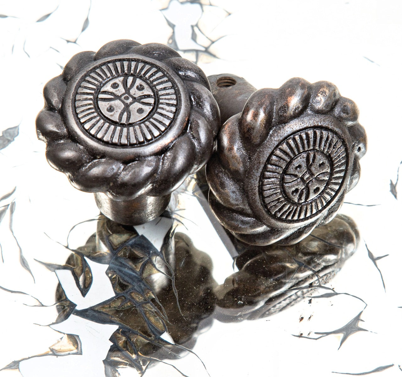 two matching original early 20th century california spanish revival style ornamental cast iron residential passage doorknobs