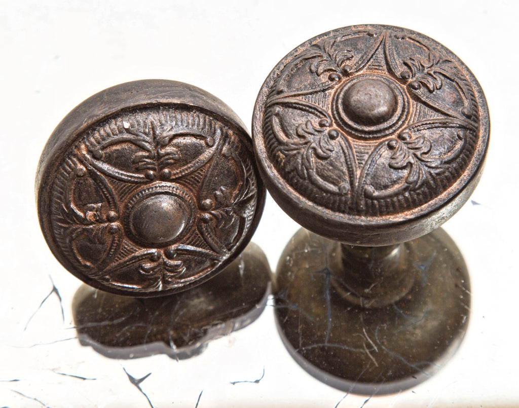 early 20th century salvaged chicago ornamental cast iron matching residential doorknobs and oval-shaped backplates
