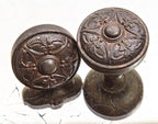 early 20th century salvaged chicago ornamental cast iron matching residential doorknobs and oval-shaped backplates