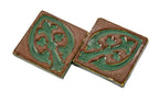 all original early 20th century matching new old stock ornamental matte glazed grueby faience tiles with distinctive "cucumber green" floral motif