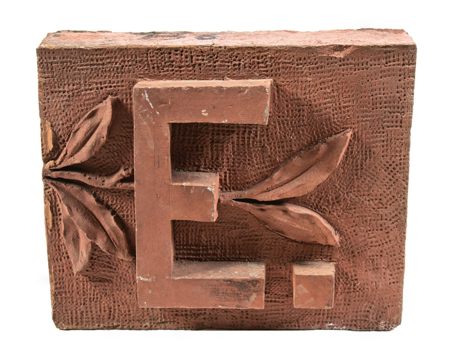 original red-slip glazed 1880s james higgie building terra cotta name panel with single block letter