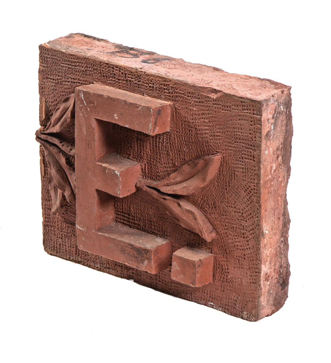 original red-slip glazed 1880s james higgie building terra cotta name panel with single block letter