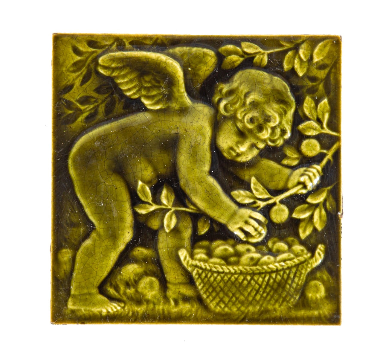 19th century original vividly-colored green majolica-glazed figural tile featuring cherub or putti with fruit basket