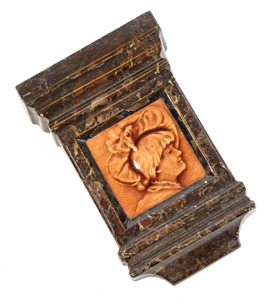 original and intact salvaged chicago cast iron fireplace mantel keystone with centrally located figural majolica tile