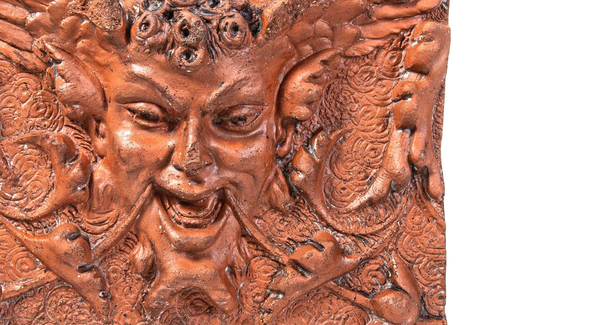 rare early to mid-1880s red slip glaze exterior residential northwestern terra cotta "satyr" figural panel or block