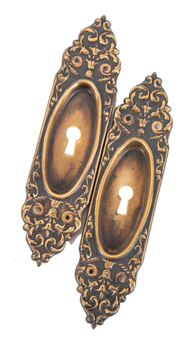 pair of early 20th century antique american wrought bronze "mura" pattern residential pocket door plates