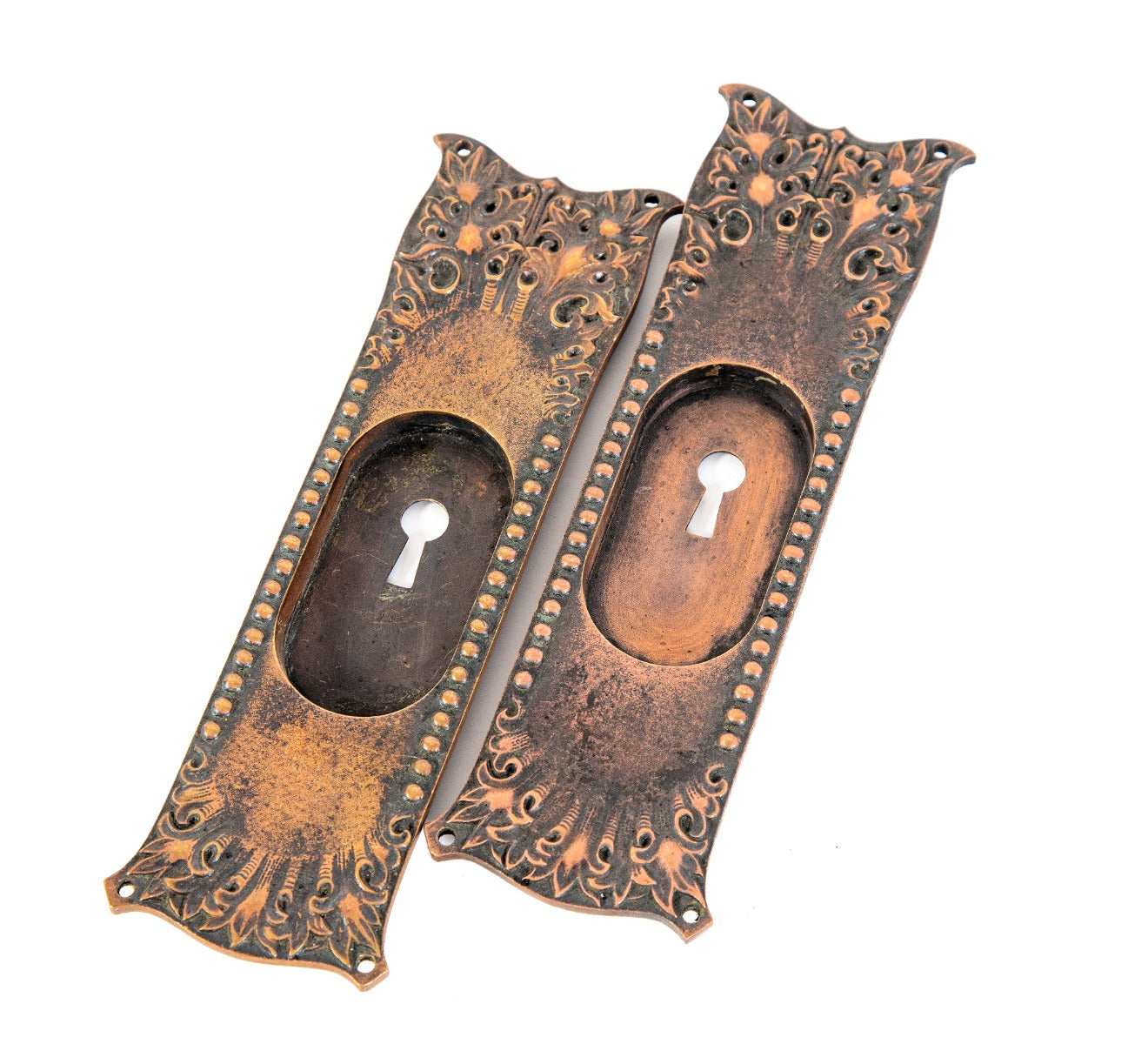 matching set of original antique american ornamental cast bronze "dresden" pattern richardsonian romanesque style pocket door backplates