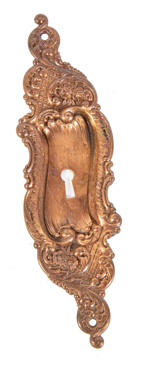 single copper-plated cast iron 19th or early 20th century interior residential rococo style pocket door backplate