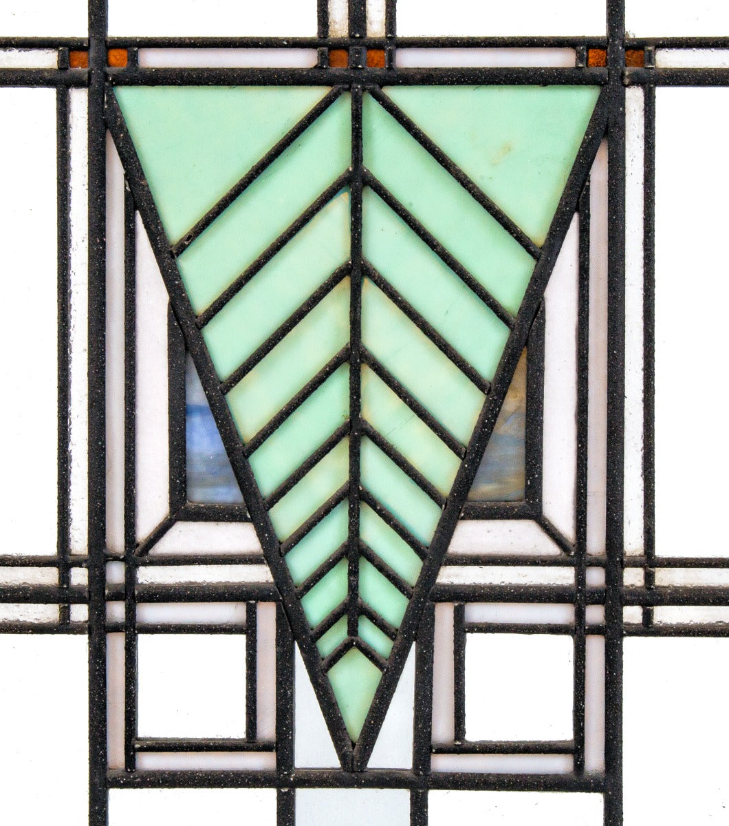 one of two matching strongly geometric early 20th century prairie style art glass window in the manner of george grant elmslie