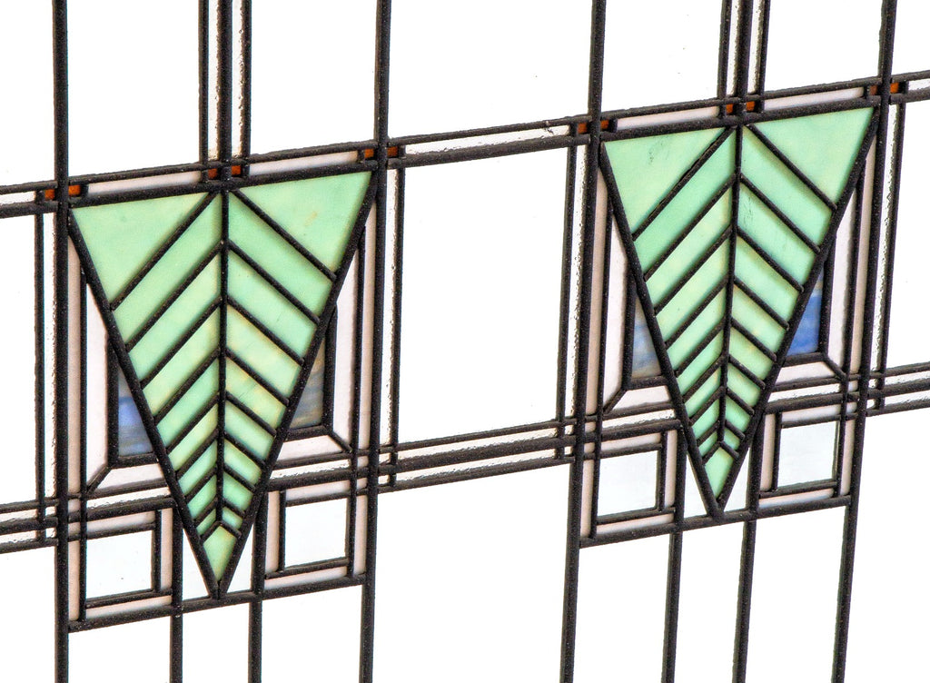 one of two matching strongly geometric early 20th century prairie style art glass window in the manner of george grant elmslie