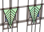 one of two matching strongly geometric early 20th century prairie style art glass window in the manner of george grant elmslie