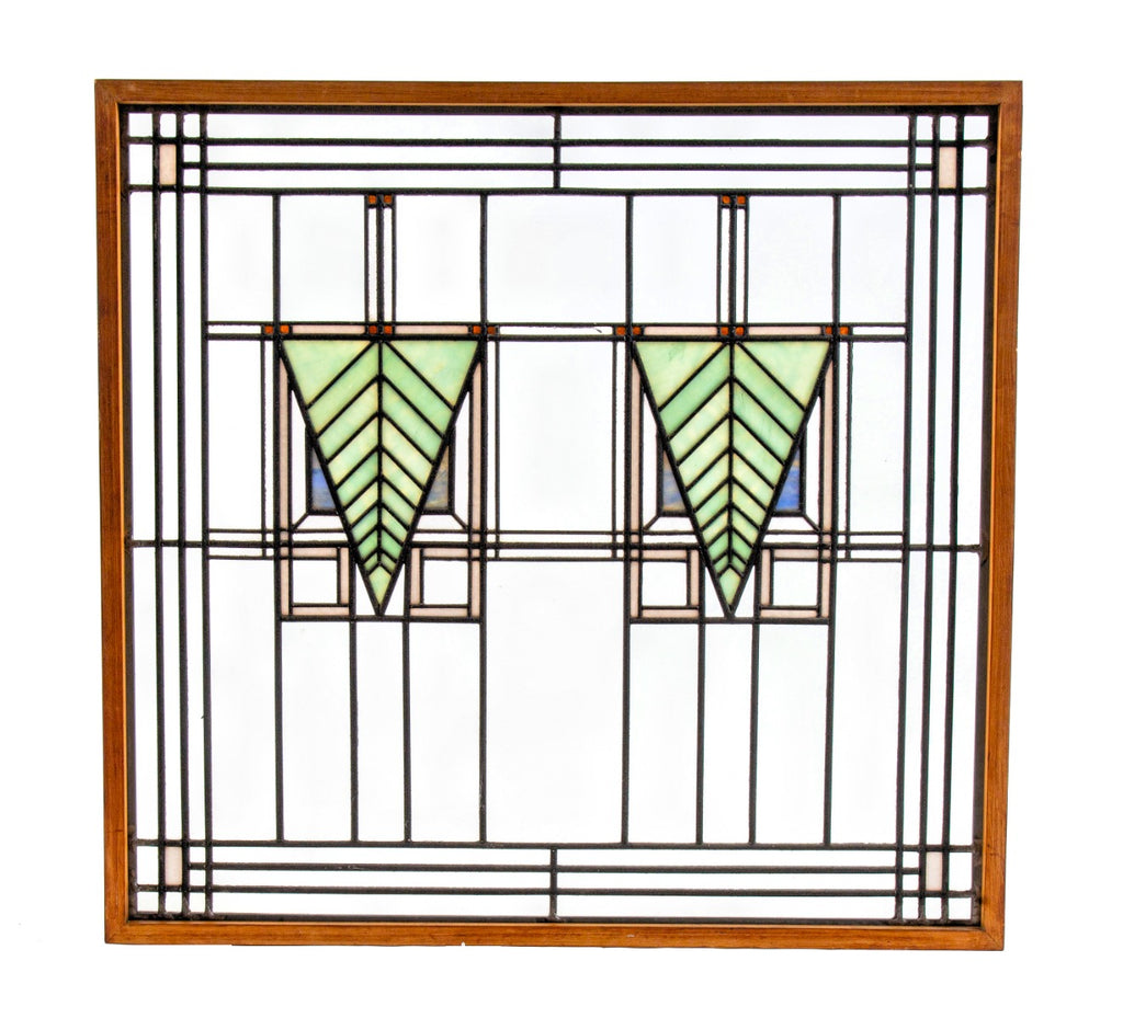 one of two matching strongly geometric early 20th century prairie style art glass window in the manner of george grant elmslie