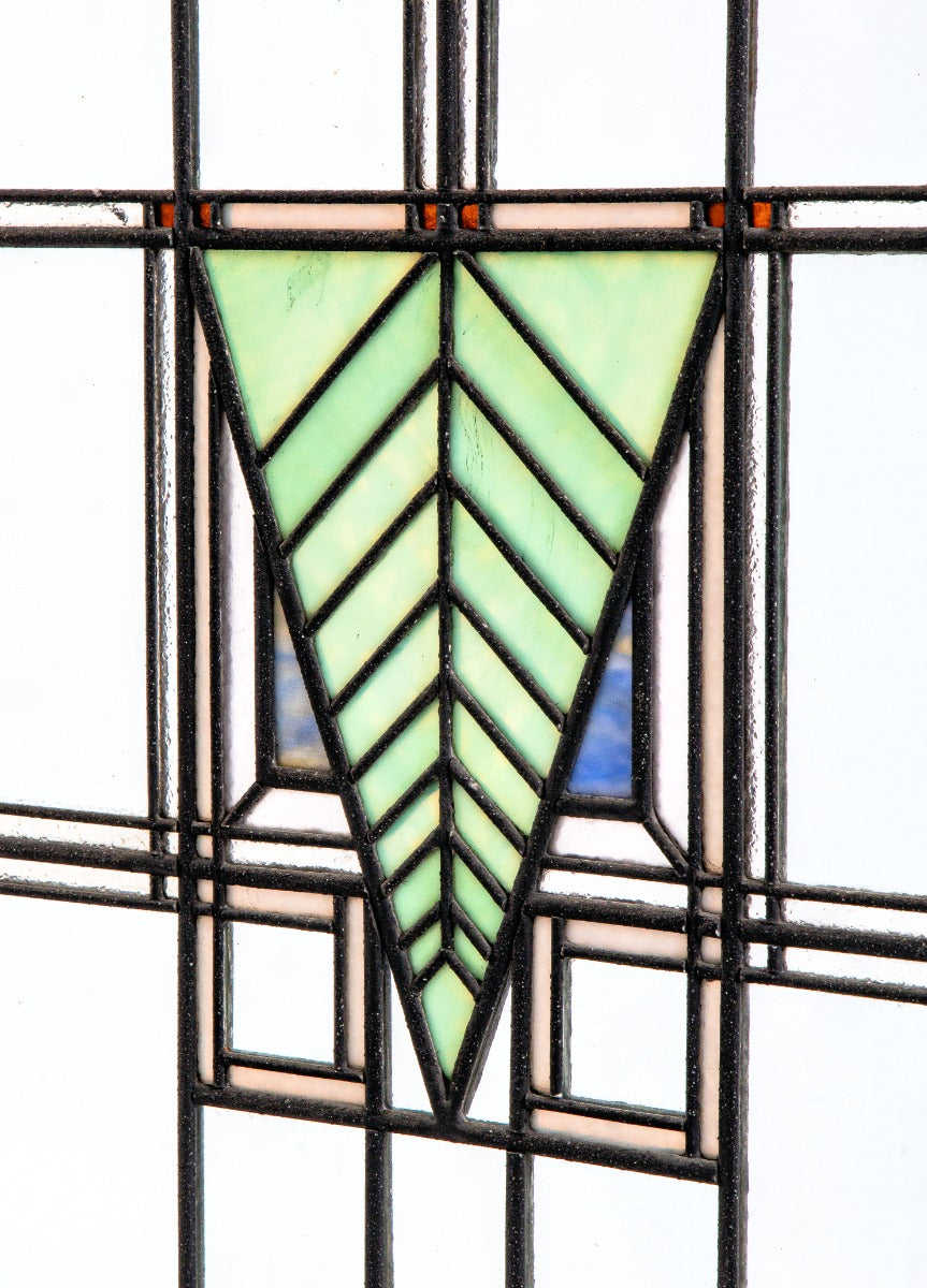 one of two matching strongly geometric early 20th century prairie style art glass window in the manner of george grant elmslie