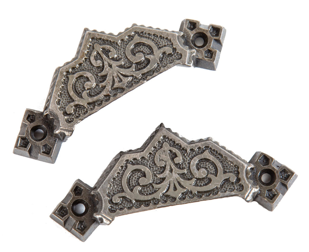 two matching oversized refinished high victorian ornamental cast iron cabinet drawer pulls with brushed metal finish