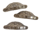 lot of three matching ornamental cast iron 1870s salvaged chicago cabinet drawer pulls with "belt buckles"