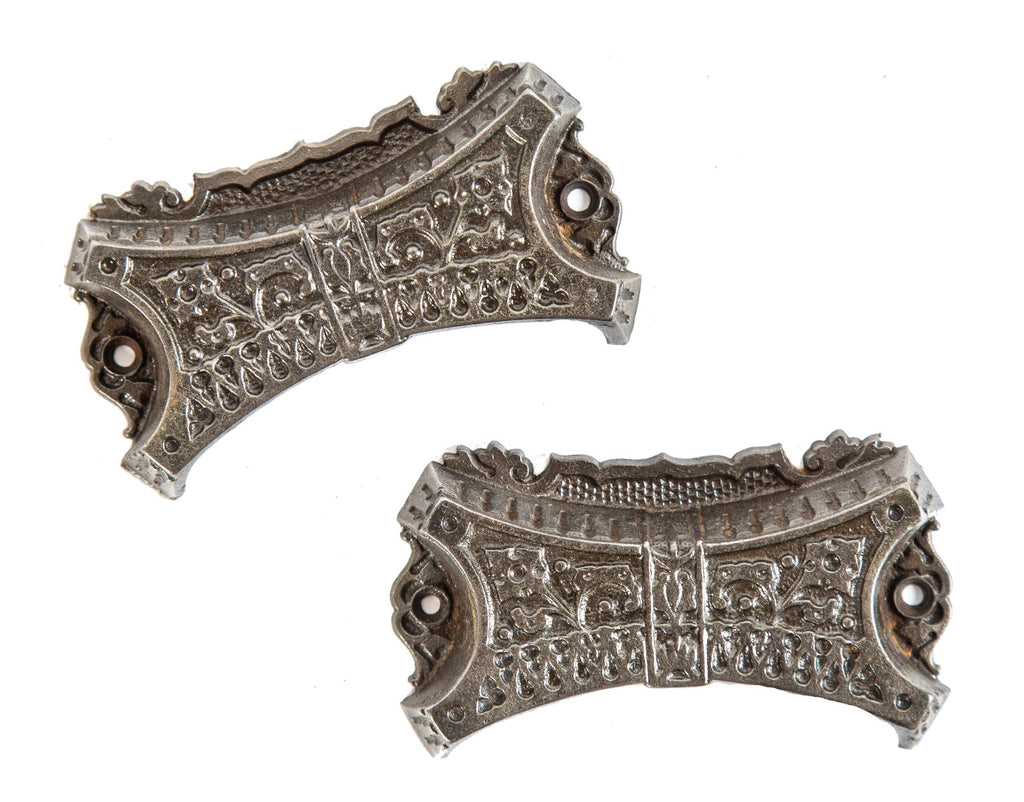 two uniquely shaped oversized ornamental cast iron american victorian style 1870s cabinet drawer pulls