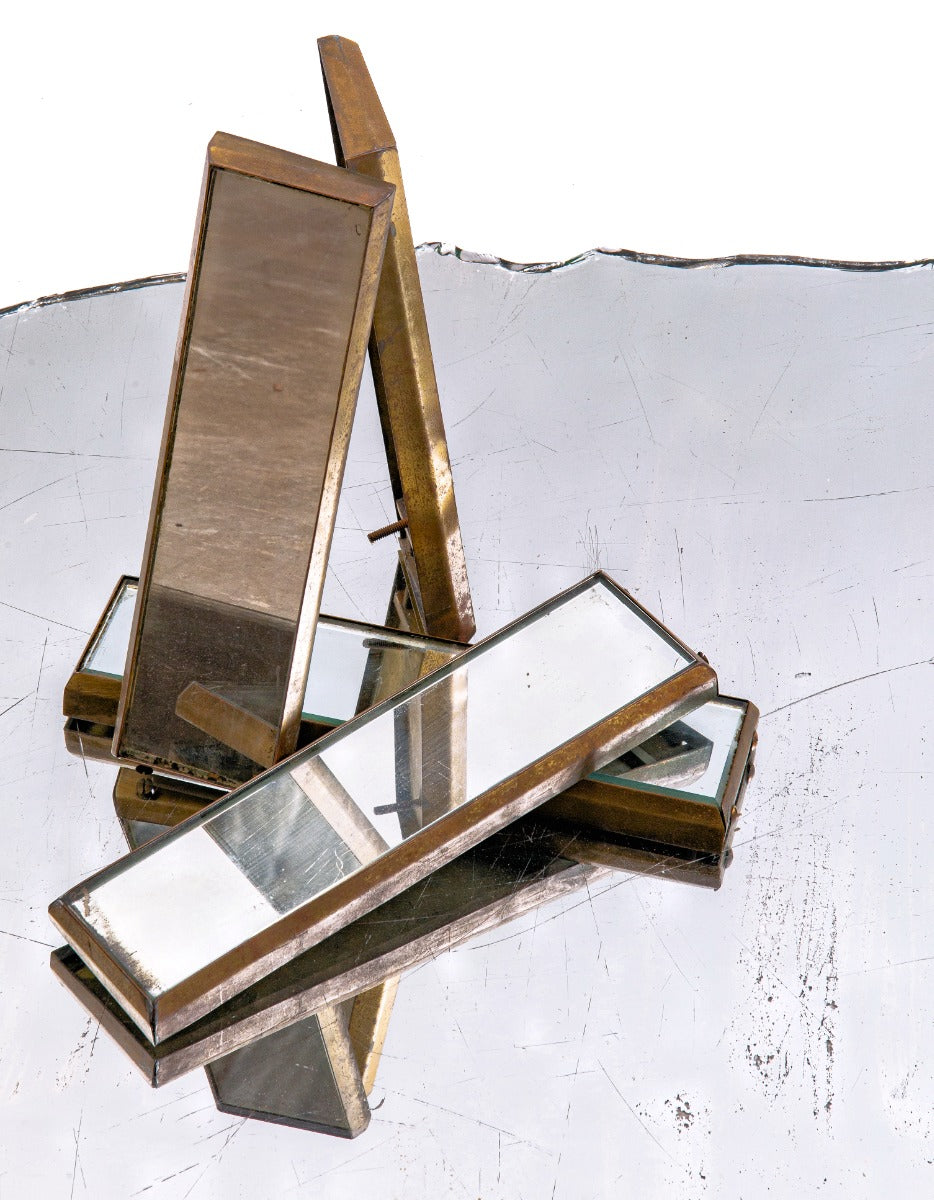 group of matching original civic opera house or building interior passenger elevator operator wall-mounted mirrors