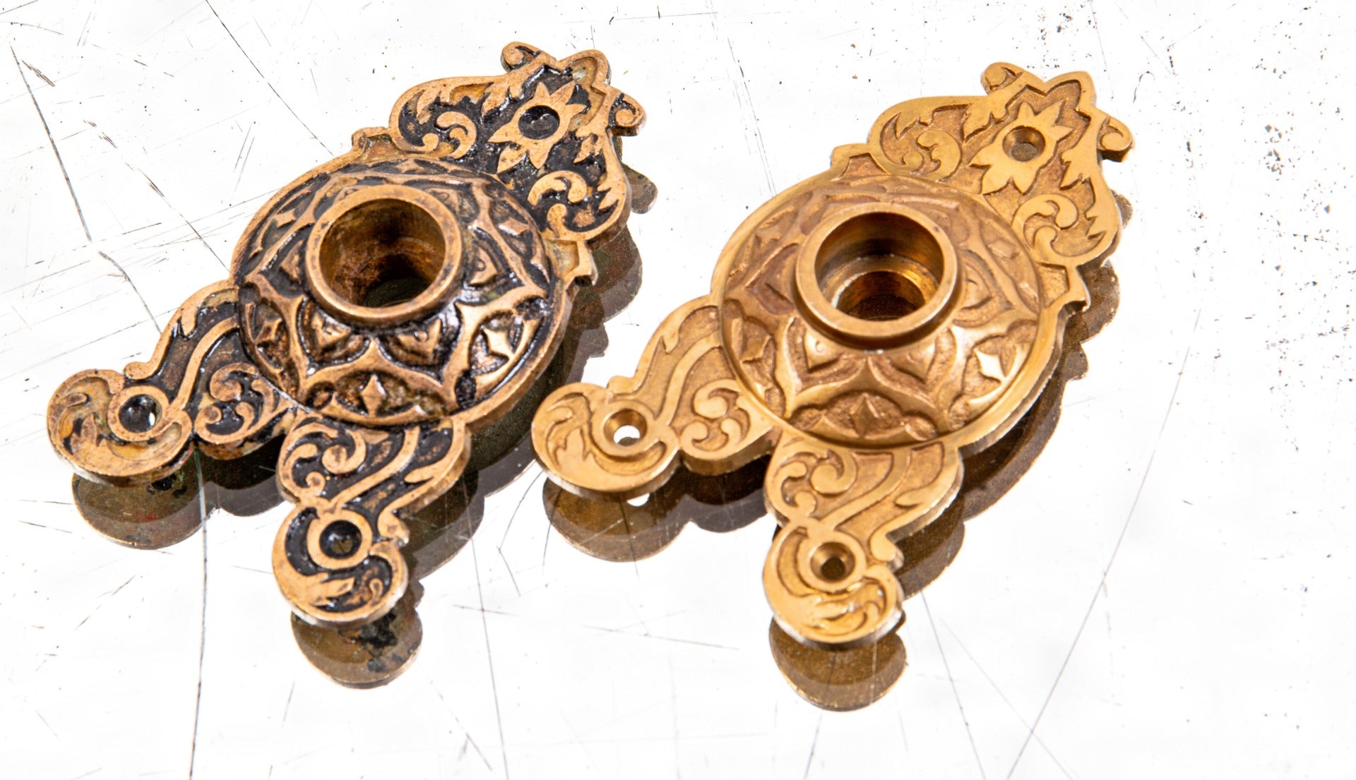 matching set of hard to find oversized 1870s oversized ornamental cast bronze triangular-shaped doorknob rosettes